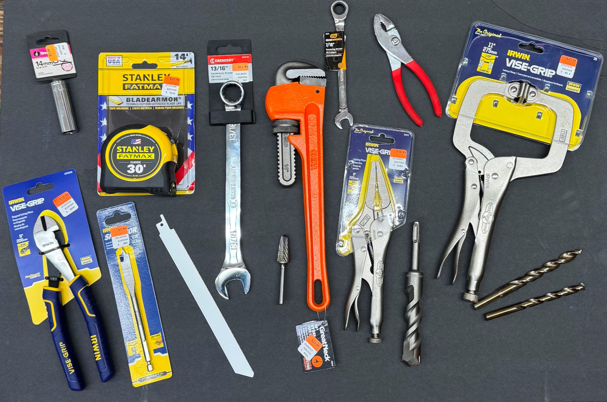 Professional tools organized on workshop wall